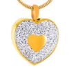 Golden heart-shaped Keepsake cremation urn pendant, ashes necklace, jewellery to commemorate family or pets