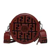 Neue Mode kleiner runder Kreisbag Neues breites Schultergurt Kreuz mit einer Freizeit -Rucksack -Eindrückungsbrief 262J