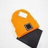 Marca Hombres Diseñador Hat Sombrero Sólido Color Sólido Mujer Deporte Ski Spats Otoño Invierno Impresión patrón Papas de bola