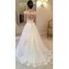 Modest New Lace Appliques Bridal Gown A line Sheer Bateau Neckline Wedding Dresses See Through Button Back Cap Sleeves197o