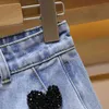 Casual Tasche patchwork Diamanti Gonna di jeans per le donne Vita alta Una linea Mini gonne Moda estiva femminile Elegante 210521