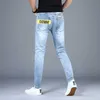 Estilo coreano moda homens jeans retrô luz azul elástico algodão rasgado streetwear impresso designer hip hop lápis pants mjo1