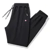 Pantaloni casual da uomo Pantaloni sportivi da uomo Cotone Primavera Autunno Pantaloni da jogging Tasche con cerniera Pantaloni in vita elastica Alta qualità Homme 17 210406