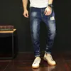 Autunno Uomo Camouflage splice Slim Stretch Jeans Classic Multi-tasca in cotone maschio Casual denim Pantaloni pantaloni Plus Size 44 48 211111