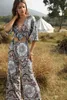 Boho Frauen Jumpsuit Aushöhlen Vordere Bogen Halbhülse Floral Gedruckt Playsuit V Ausschnitt Mode Elegant Neue Vintage Stil Kleid 210412