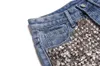 Jeans da donna moda donna vintage nappa rivetto strappato a vita alta corto punk donna sexy pantaloncini di jeans effetto baffi