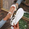 European and American large pearl bow hot drill flat bottom Rhinestone clip foot herringbone slipper sandals women