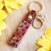 Keychains jóias ocidentais Tono de ouro do cheiro de couro cabeludo de couro genuíno Glitter Key Rings Handle Handle Miri22