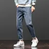 Koreański styl moda mężczyźni dżinsy luźne dopasowanie casual bawełniane denim harem spodnie zima ciepły Vet vintage projektant szerokie spodnie nogi