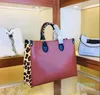 Latest Styles top quality Wild at Heart series bags Onthego tote designers handbags Cow leather embossed leopard print mommy bag237n