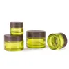 Olive Green Glass Cosmetic Jars Empty Makeup Sample Containers Bottle with Wood grain Leakproof Plastic Lids BPA for Lotion 7918728