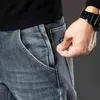 Jeans invernali da uomo in pile caldo stile classico business casual vestibilità regolare addensare pantaloni in denim elasticizzato pantaloni di marca maschile 211124