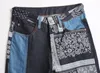 Jeans da uomo streetwear pantaloni denim hip-hop harajuku patchwork moda pantaloni slim blu per uomo