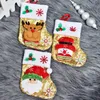 Bling Christmas Kousen Kerst Ornament Santa Snowman Figurine Sequin Small Gift Bag Mes Fork Cover Set voor Home Party Dinner GGE1784