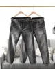 Luxurys Designer Jeans da uomo Estate Design sottile Modello denim Pantaloni neri Cotone Moda vintage Gamba sottile 21SS Ultimi pantaloni lavati leggeri Listin Taglia USA 29-38