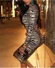 Femme robe Sexy Slim Fit à manches longues col roulé dames peau de tigre imprimé fête moulante Clubwear gaine vêtements 210522