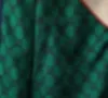 メンズジャージデザイナー高級メンズトラックスーツジャケットパッチワーク生き抜くスウェットシャツスーツヨーロッパジッパークラシックレタープリントスポーツウェアパンツ赤緑ストライプSKJ