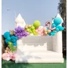 white bounce house for wedding