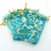 7x9cm bleu clair coeur bronzant Organza bijoux sacs populaires pas cher pochettes en Organza thé sac de rangement 500 pcs/lot en gros