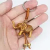 Femmes hommes chanceux en bois éléphant sculpture pendentif Religion chaîne porte-clés porte-clés bijoux entier mignon porte-clés