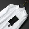 Camicia da uomo con tasca impiombata in bianco e nero Camicia da uomo a maniche lunghe in tinta unita slim business 2021 Camicie eleganti in puro cotone al 100%