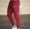 Dressuit Dressants Jesień Męskie Joggers Casual Spodnie Fitness Sportswear Skinny Gyms Spodnie Mężczyzna działa