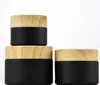 wood lid bottle Wholesale Black Frosted Glass Jars Cosmetic Jar With Woodgrain Plastic lids PP liner 5G 10G 15G 20G 30G 50G lip Packing Bottles