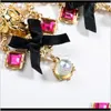 Charme bijoux livraison directe 2021 vent exagération S925 Sier aiguille acrylique diamant alliage fleur femmes Satin nœud boucles d'oreilles Anfnv