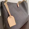 M43704女性の優雅なバッグ財布MMホーボクラシックな財布純正レザースプリープルフラットストラップレディショルダーバッグ