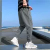 Hip Hop Jogadores Homens Preto Harem Calças Multi-Pocket Fita Outono Homem Sweetpants Streetwear Casual Mens Calças Y0927