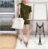 S-XL Kvinnor Ficka Casual Kortärmad Bredt Ben Jumpsuits Off Shoulder Loose Romper Summer Army Green Beachwear Overaller 210517