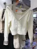 Primavera diseño de moda europea suéter con cuello en v perspectiva gasa remendado de punto de un solo pecho manga rhinestone cardigan abrigo corto