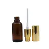 Lozione spray d'oro Pompa per pressa Emulsione Bottiglia riutilizzabile Profumo di vetro marrone vuoto Fiale per contenitori di imballaggio cosmetico 5ml 10ml 20ml 30ml 50ml 100ml