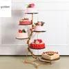 パーティーデコレーション錬鉄製のケーキスタンド多層ウェディングラックフルーツと野菜の棚の装飾的な背景donut7407240