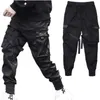 Hip Hop Chłopiec Kieszenie Elastyczna Talia Harem Spodnie Mężczyźni Streetwear Punk Casual Wstążki Design Spodnie Jogger Mężczyzna Taniec Black Pant 210616