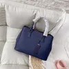 Newset Bolsos clásicos Lady Killer Bag Bolsos de hombro con patrón cruzado Bolso de mano para mujer Correa de embrague de cuero genuino Totes255f