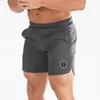 Muscleguys erkekler ince fit kısa pantolonlar fitness vücut geliştirme joggers erkekler şort eşofmanları fitness egzersiz kuru hızlı şort 210421