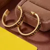 Gold Hoop Earrings Designers رسائل أزياء ترصيع حرك للنساء العشاق هدية المجوهرات الفاخرة العلامات التجارية F Box 22011002R