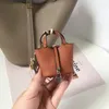 Luxurys llavero cadena caso Bolsos gancho diseñador bolsos suspensión airpods casos auriculares Accesorios mini Satchel bolso de mano mujer bolso compuesto dama