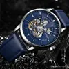 Orologi di lusso da uomo Orologi di alta qualità Quadrante blu militare Hollow Swiss l'orologio da polso impermeabile con cinturino in pelle meccanico automatico da uomo