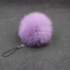 Cadeaux de fête de mariage Pompom Keychain Fluffy Fur Pom Soft Fur Ball Car Caryring Clé Chains Holder Femmes Sac Pendant Jewelry Favoule Fournitures