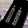 Luxe Zilveren Kleur Letter CZ Crystal Rhinestone Lange Hanger Tassel Drop Oorbellen Voor Vrouwen Bruiloft Sieraden