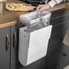 2-in-1 Porta dell'armadio da cucina Bidone della spazzatura sospeso con scatola di fazzoletti staccabile Cestino della spazzatura Borsa Staffa Rack Contenitore della spazzatura 210728