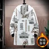 Hiver polaire lâche longue tranchée manteau hommes lettre style imprimé à capuche pardessus noir hip hop streetwear coréen veste pour hommes 211011