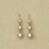 Projektant biżuterii moda długie okrągłe kolczyki perłowe złoty kolor Dangle Tassel dla kobiet luksusowy elegancka marka bijoux żyrandol 263R