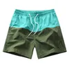 Pantalones cortos elásticos suaves y transpirables para hombres Moda Color simple Bloque Hogar Playa suelta Casual 210713
