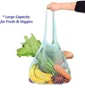 Tragbare Schlagnetz-Einkaufstüten für Gemüse und Obst im Supermarkt. Hohle Polyestertasche aus reiner Baumwolle