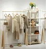 Clothing store display rack Commercial Furniture women cloth shop hanging Organization shoe bag racks landing against the wall clothes Storage Holders white