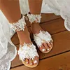 sandalias planas blancas flores
