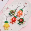 10st Simulerad frukt Avokado Keychain 3d Soft Resin Leende Avokado Nyckelringar Par Smycken Kvinnor Mode Jul Liten Present G1019